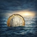 Euro coin sinking in water. Euro crisis concept.